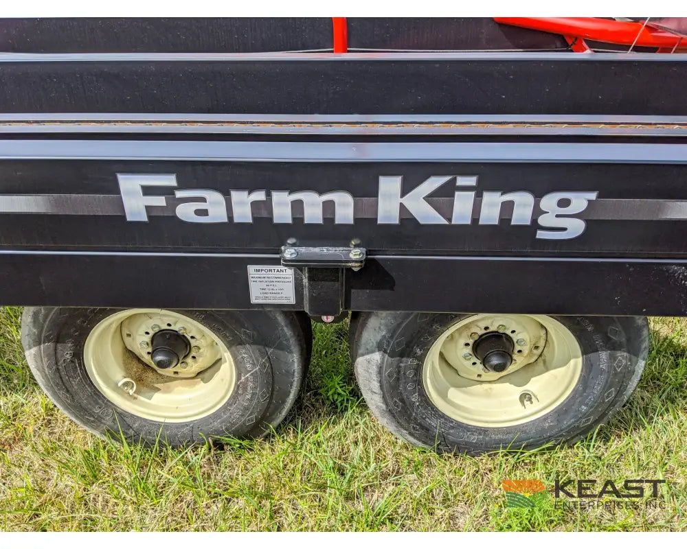 Farm King 2400 Round Bale Carrier - 8 Bale Capacity Self Loading Arm Feed Wagons
