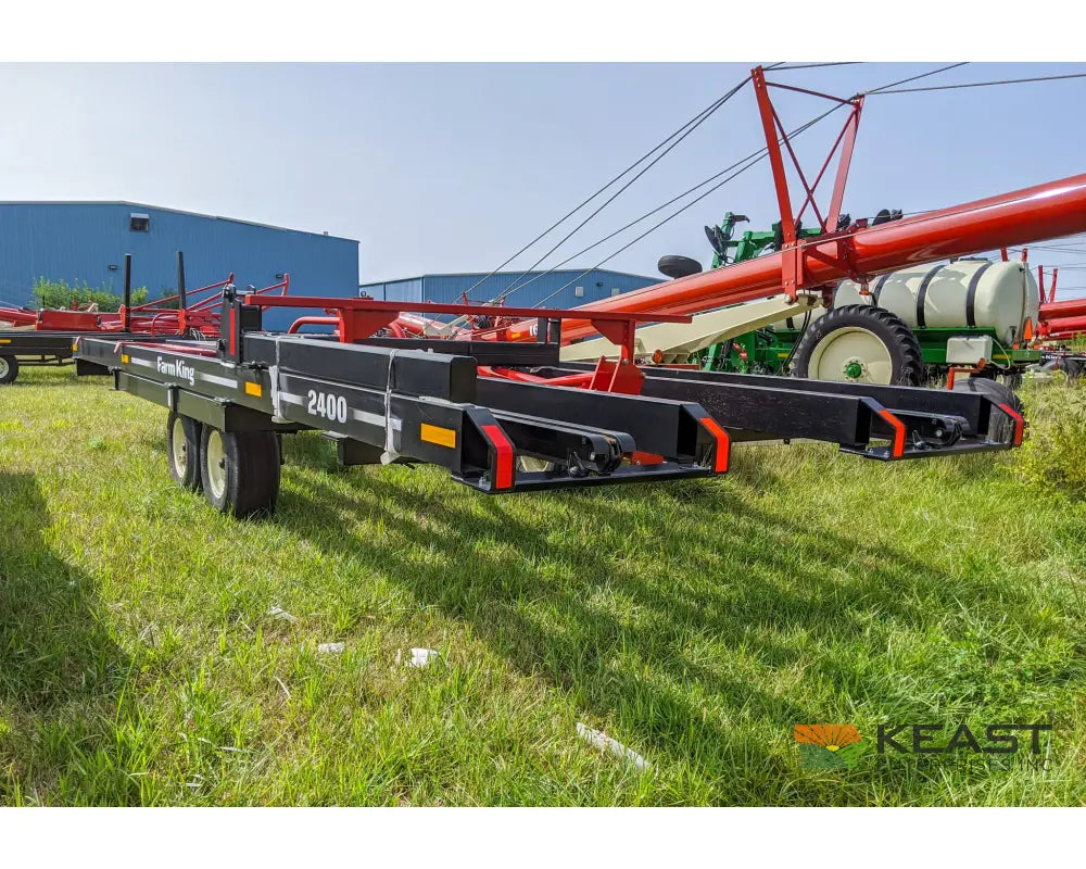 Farm King 2400 Round Bale Carrier - 8 Bale Capacity Self Loading Arm Feed Wagons