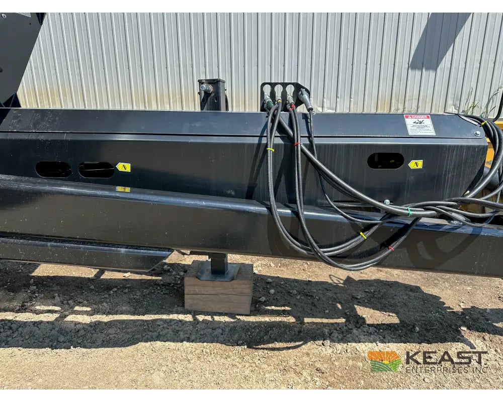 J&M 1312T Tracked Grain Cart 1,325 Bushel Capacity Roll Tarp 20’’ Discharge Scales Grain Carts