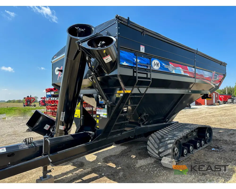 J&M 1312T Tracked Grain Cart 1,325 Bushel Capacity Roll Tarp 20’’ Discharge Scales Grain Carts