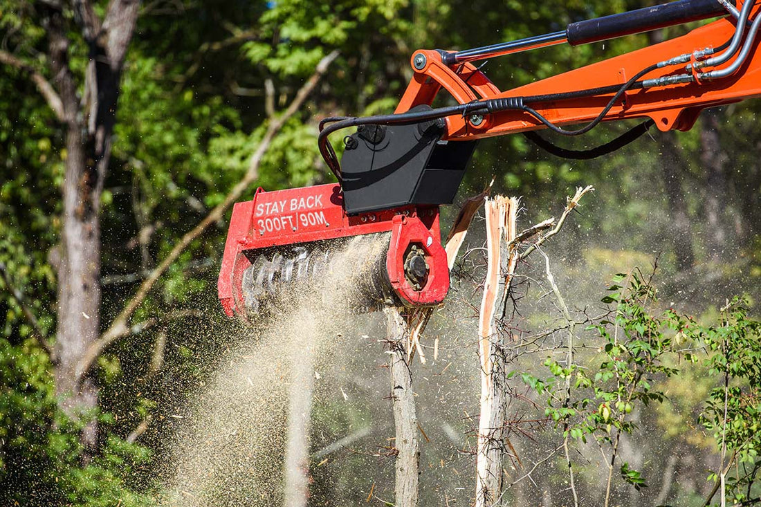 Fecon Bull Hog excavator mulcher cutting a small tree