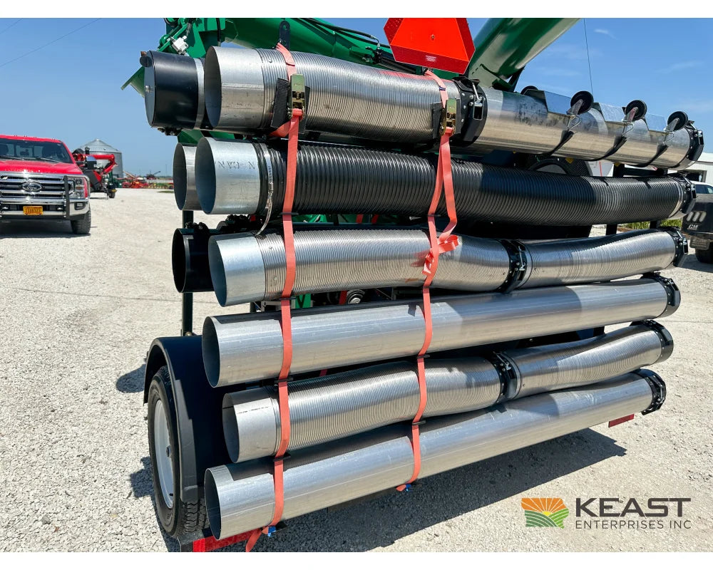 AGI REM VR12 grain vac full pipe and hose package strapped to the storage rack
