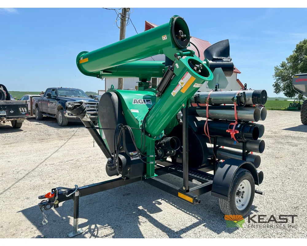 AGI REM VR12 grain vac, hitch-side view with raised discharge auger