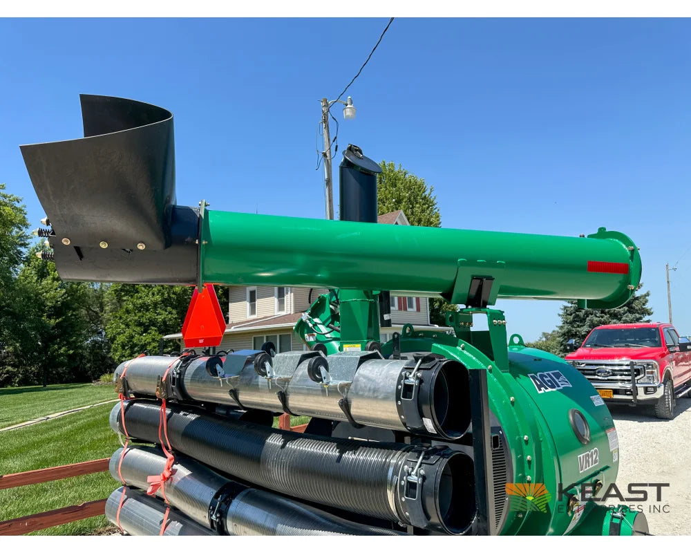 AGI REM VR12 rear three-quarter view with discharge auger extended