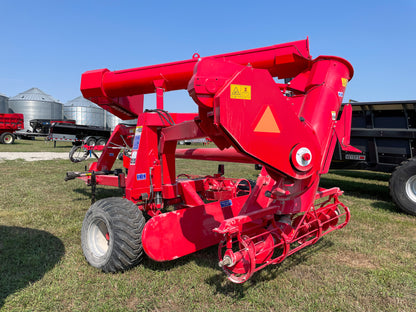 Akron EXG400X rear three-quarter view with pickup augers — predecessor-model reference photo for EXG480X