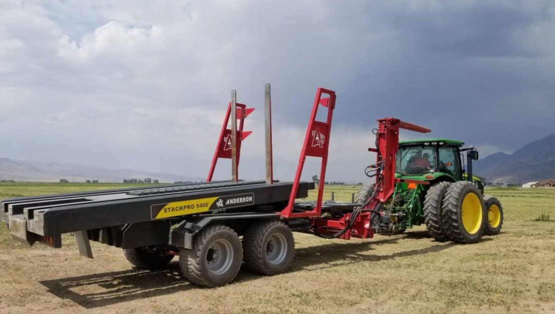 Anderson StackPro 5400 bale stacker with empty bed and tandem wheels