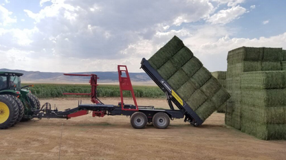 Anderson StackPro 5400 tilting a stack of square bales for unloading