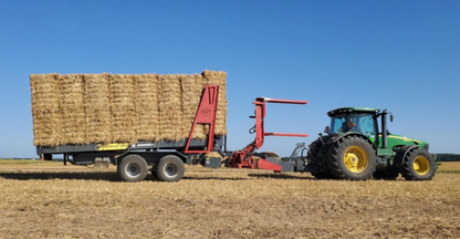 Anderson StackPro 7200 transporting a load of square bales