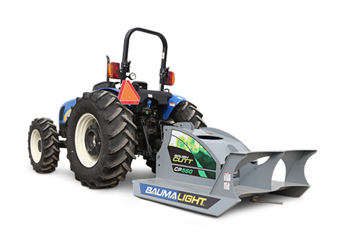 Baumalight CP560 three-point rotary brush cutter on a tractor, whole-machine application view
