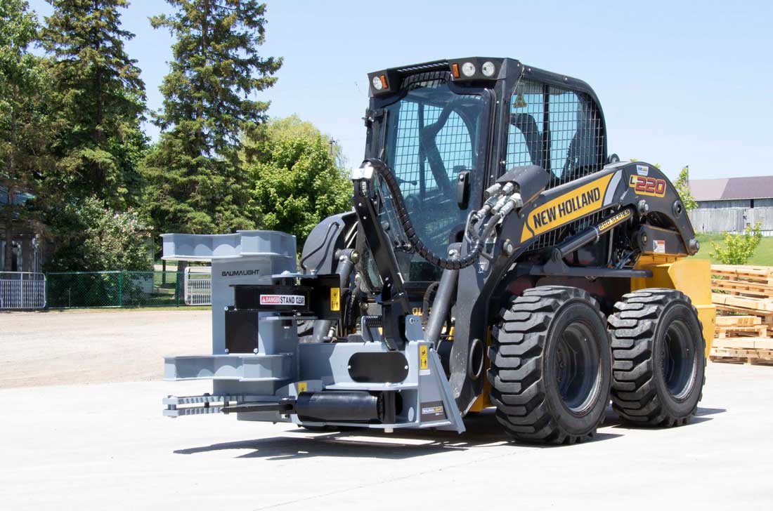 Baumalight ISH510G tree shear on a New Holland skid steer, working-position view
