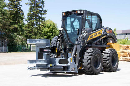 Baumalight ISH510G tree shear on a New Holland skid steer, working-position view