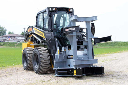 Baumalight ISH712G horizontal tree shear with its grabber open, three-quarter view on a skid steer
