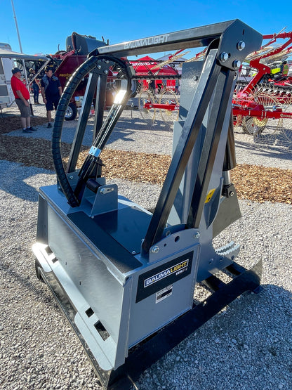 Baumalight ISR512 tree shear, three-quarter view from the skid-steer mounting side