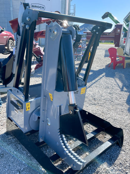 Baumalight ISR512 tree shear showing the hydraulic cylinder and open cutting jaw