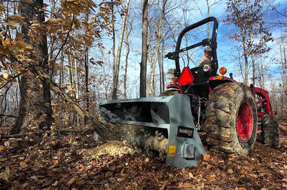 Baumalight MP360 three-point mulcher clearing brush behind a tractor