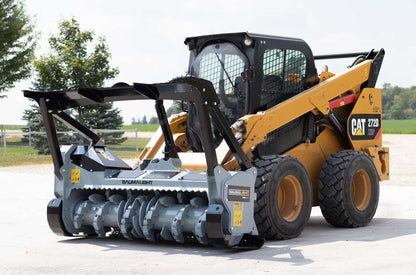 Baumalight MS1472 mulcher with integrated push bar mounted on a skid steer