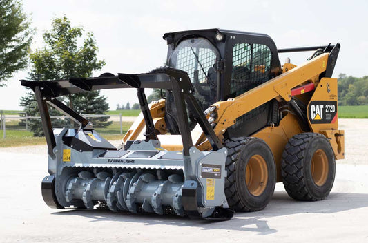 Baumalight MS1472 mulcher with integrated push bar mounted on a skid steer