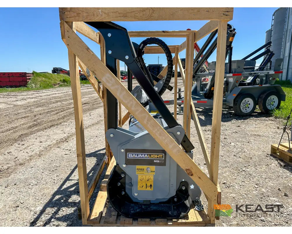 Baumalight MS972 skid steer mulcher in shipping frame, front view