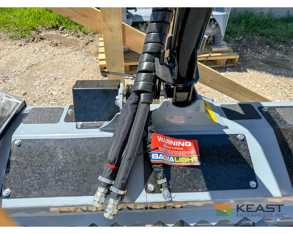 Baumalight MS972 hydraulic hose and protected housing detail