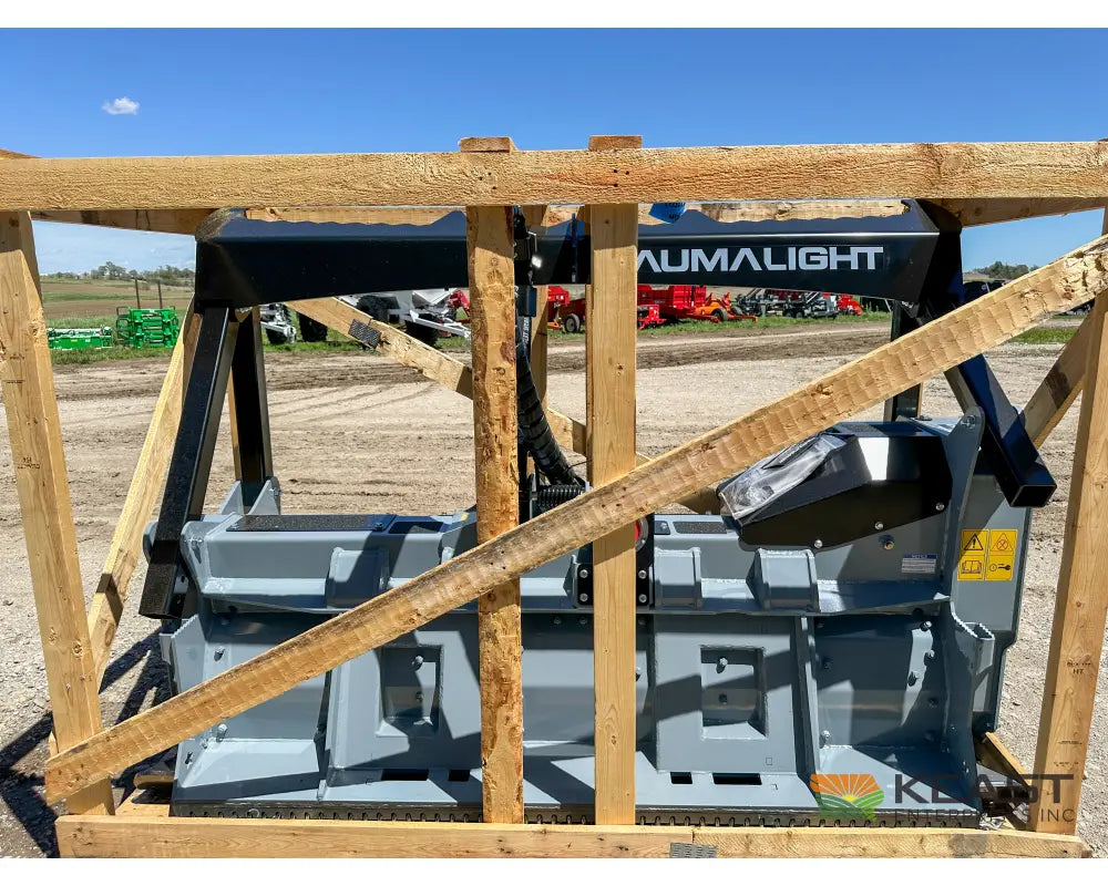 Baumalight MS972 skid steer mulcher in wooden transport frame