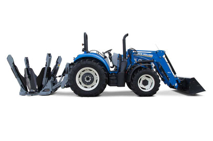 Baumalight PT440 tree spade lowered behind a tractor, side view
