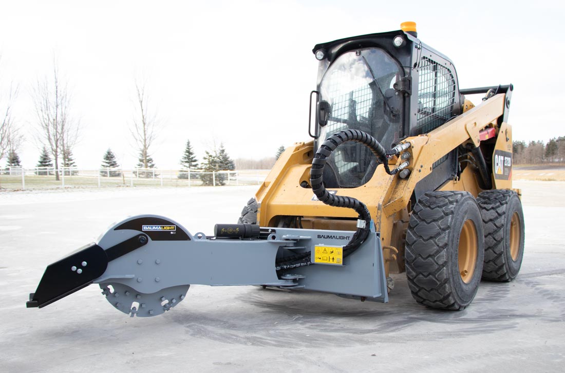Baumalight S22 stump grinder and skid steer, opposite three-quarter view