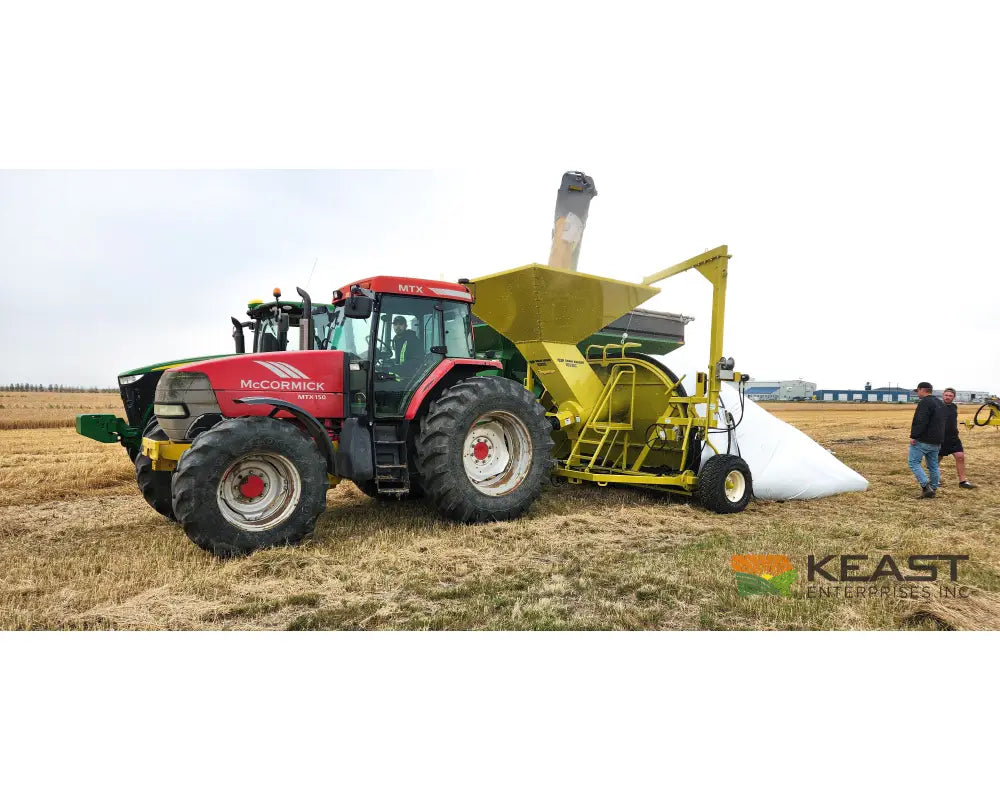 Representative RENN RGB 1020C 10-foot grain bagger operating in the field