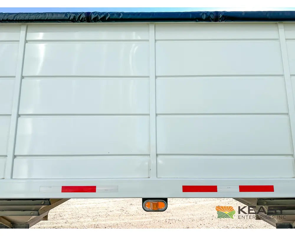 Demco 40’ Hopper Bottom Grain Trailer - 1,130 Bushel Heaped Capacity Roll Tarp Grain Trailers