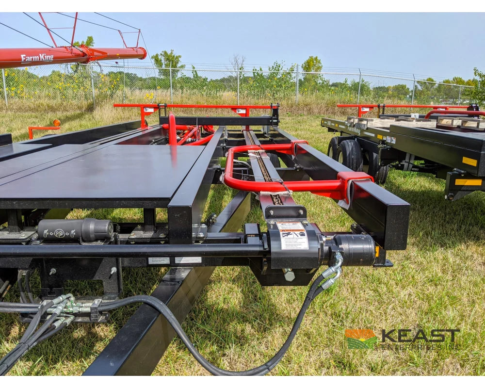 Farm King 2400 Round Bale Carrier - 8 Bale Capacity Self Loading Arm Feed Wagons
