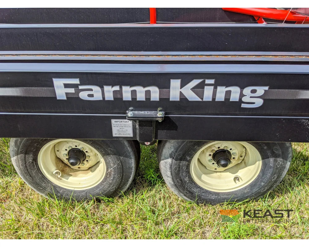 Farm King 2400 Round Bale Carrier - 8 Bale Capacity Self Loading Arm Feed Wagons
