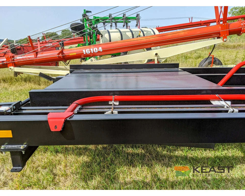 Farm King 2400 Round Bale Carrier - 8 Bale Capacity Self Loading Arm Feed Wagons