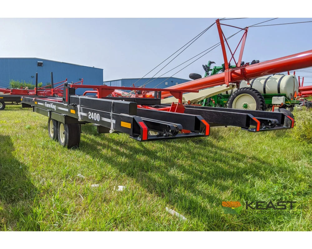 Farm King 2400 Round Bale Carrier - 8 Bale Capacity Self Loading Arm Feed Wagons