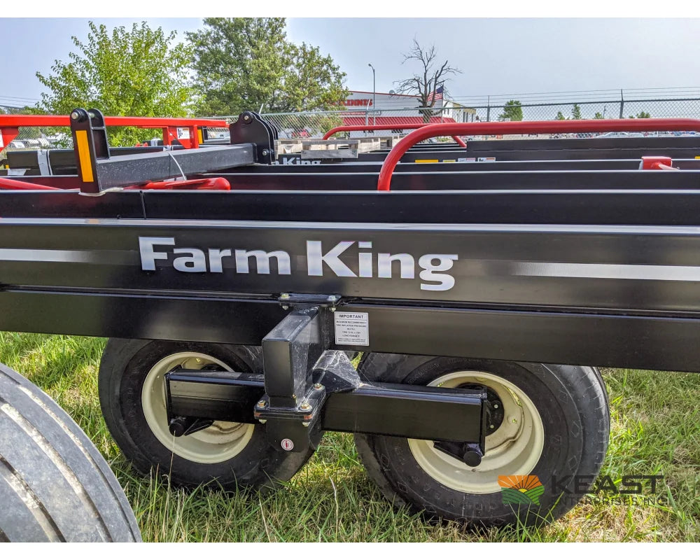 Farm King 2400 Round Bale Carrier - 8 Bale Capacity Self Loading Arm Feed Wagons