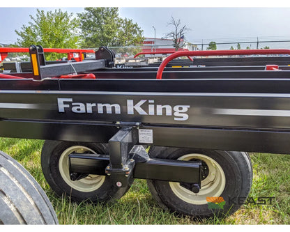 Farm King 2400 Round Bale Carrier - 8 Bale Capacity Self Loading Arm Feed Wagons