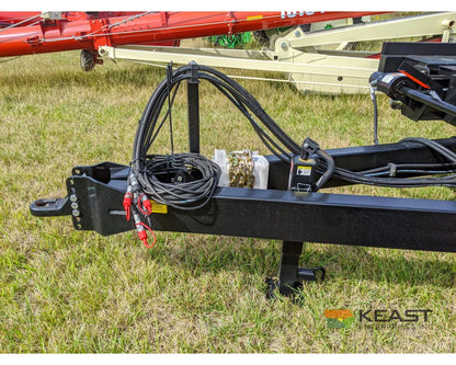Farm King 2400 Round Bale Carrier - 8 Bale Capacity Self Loading Arm Feed Wagons