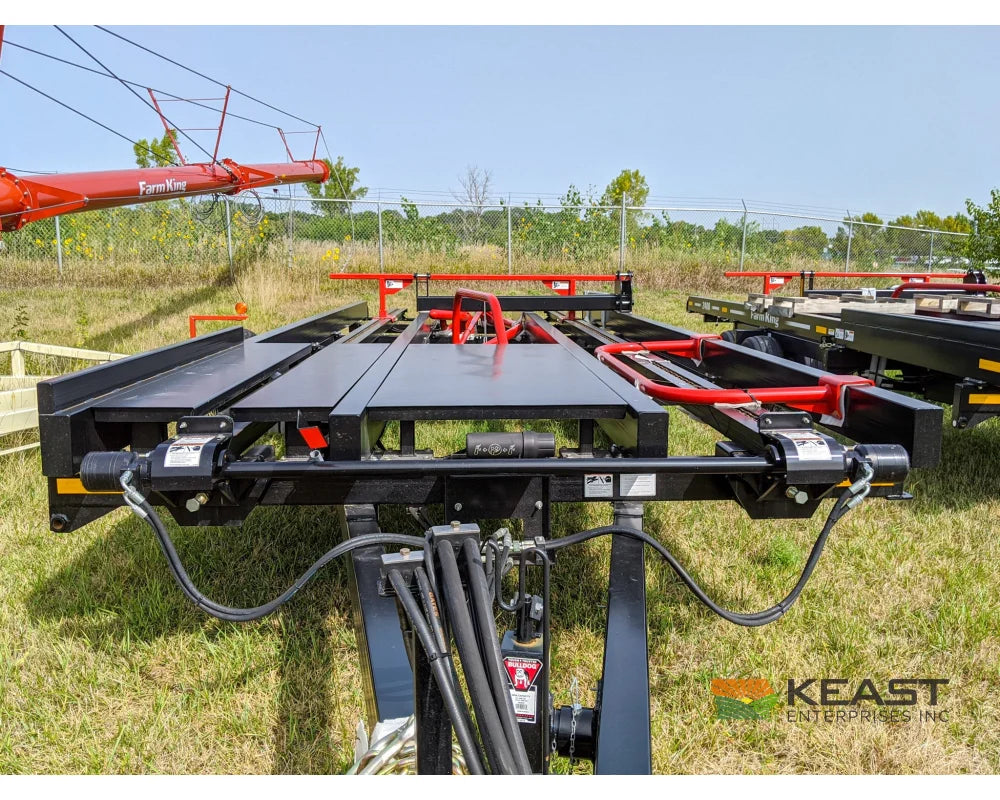 Farm King 2400 Round Bale Carrier - 8 Bale Capacity Self Loading Arm Feed Wagons