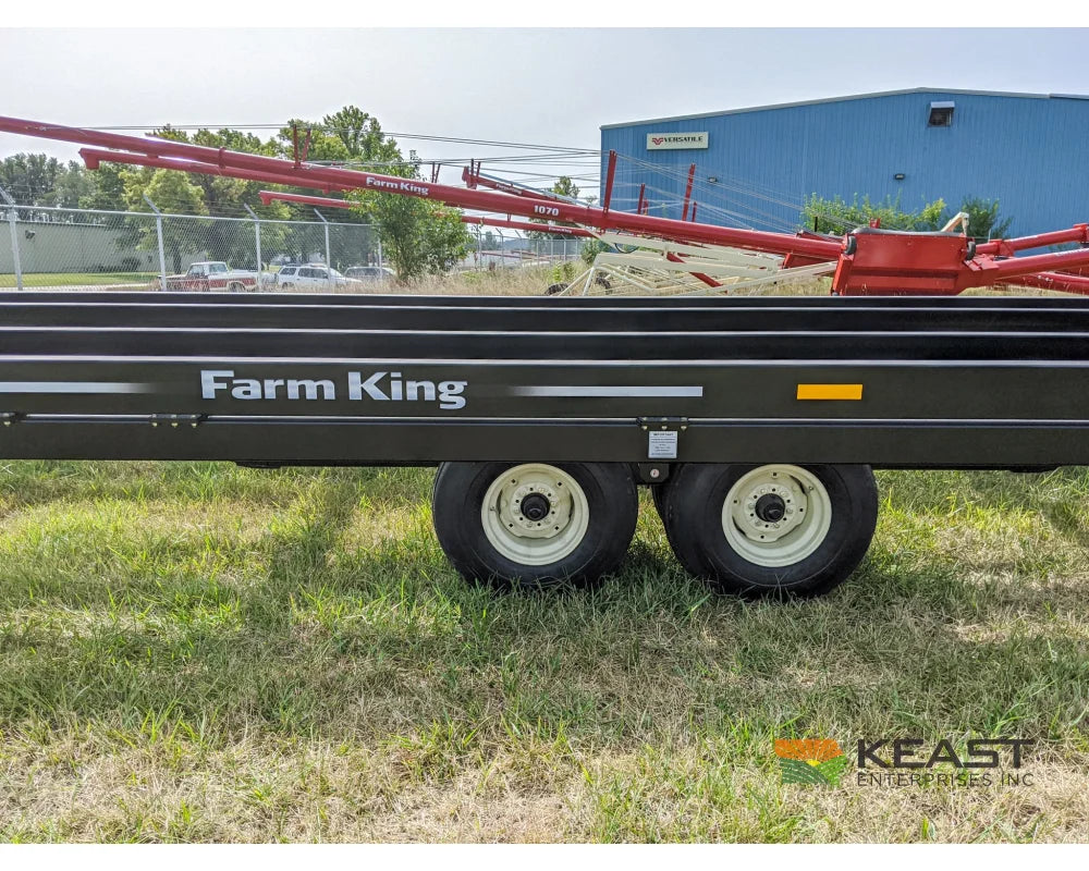 Farm King 2400 Round Bale Carrier - 8 Bale Capacity Self Loading Arm Feed Wagons