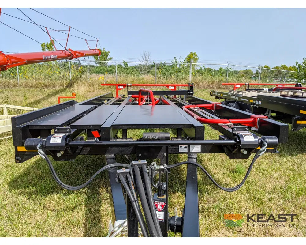 Farm King 2400 Round Bale Carrier - 8 Bale Capacity Self Loading Arm Feed Wagons