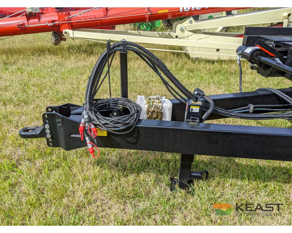Farm King 2400 Round Bale Carrier - 8 Bale Capacity Self Loading Arm Feed Wagons