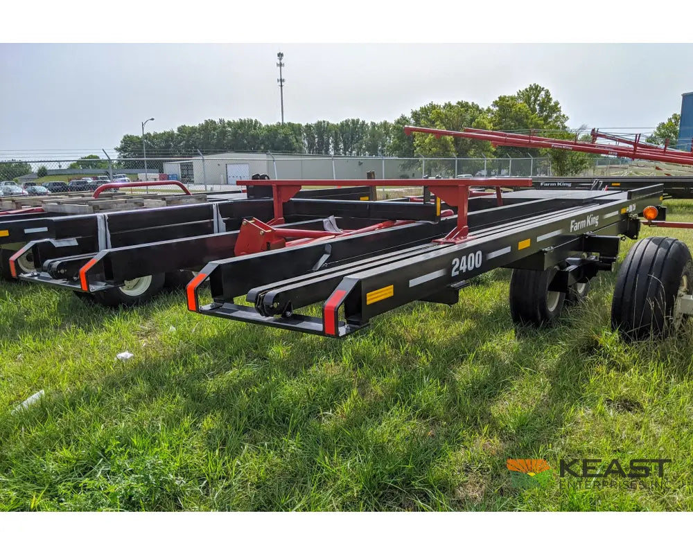 Farm King 2400 Round Bale Carrier - 8 Bale Capacity Self Loading Arm Feed Wagons