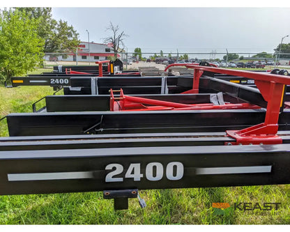 Farm King 2400 Round Bale Carrier - 8 Bale Capacity Self Loading Arm Feed Wagons