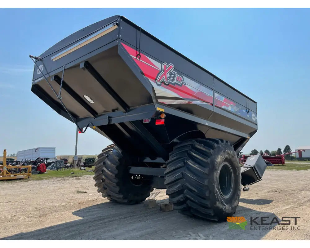 J&M 1112 Grain Cart - 1,150 Bushel Capacity Roll Tarp 20’’ Discharge Scales Grain Carts