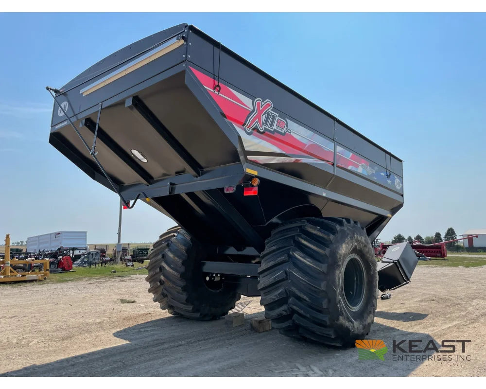 J&M 1112 Grain Cart - 1,150 Bushel Capacity Roll Tarp 20’’ Discharge Scales Grain Carts