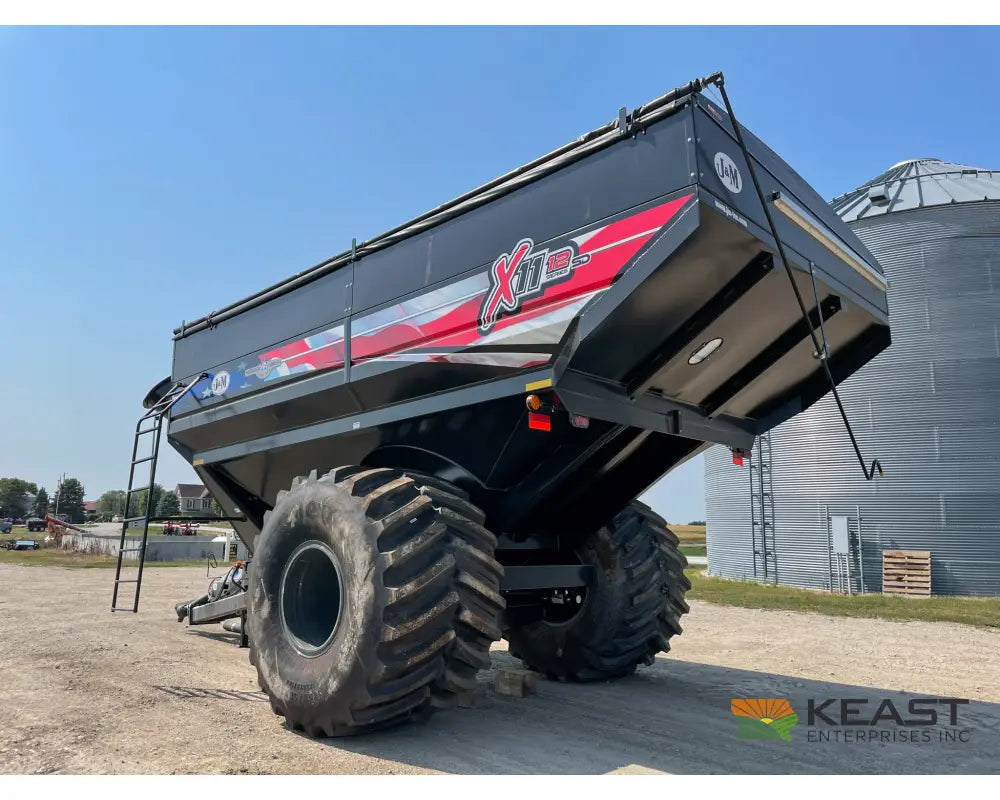 J&M 1112 Grain Cart - 1,150 Bushel Capacity Roll Tarp 20’’ Discharge Scales Grain Carts