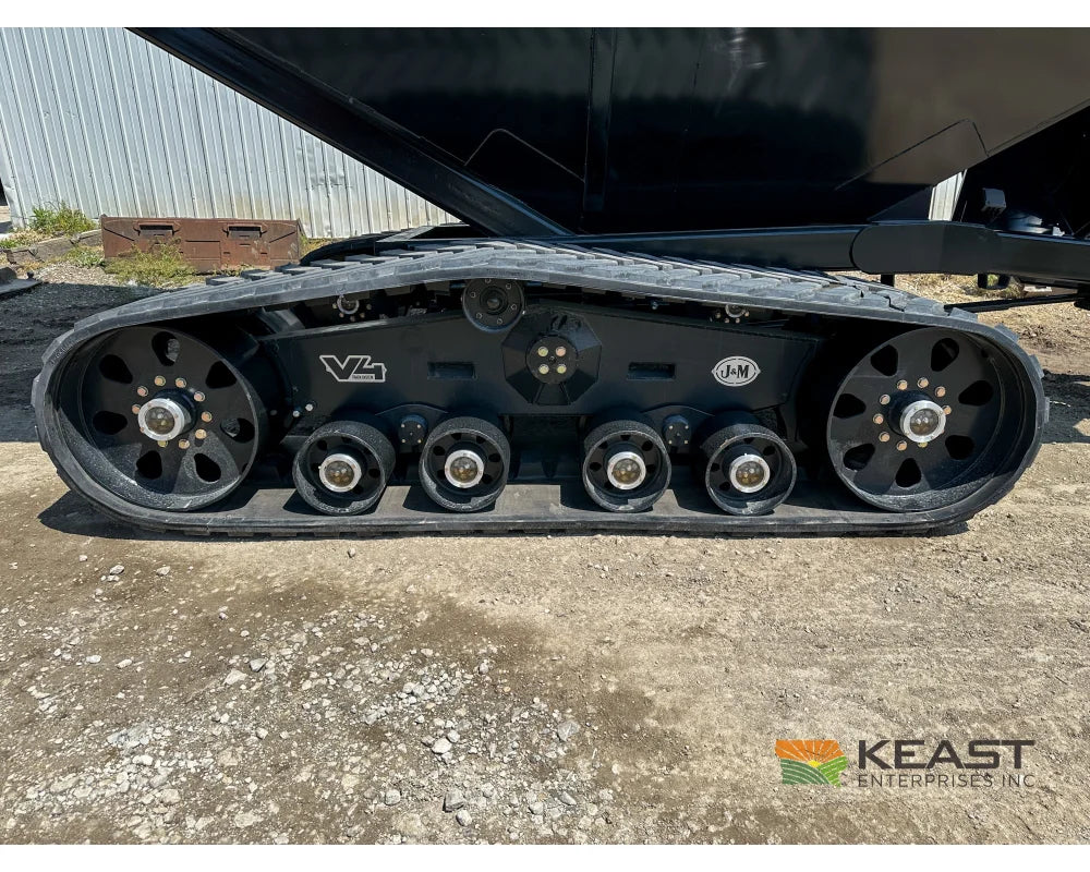 J&M 1312T Tracked Grain Cart 1,325 Bushel Capacity Roll Tarp 20’’ Discharge Scales Grain Carts