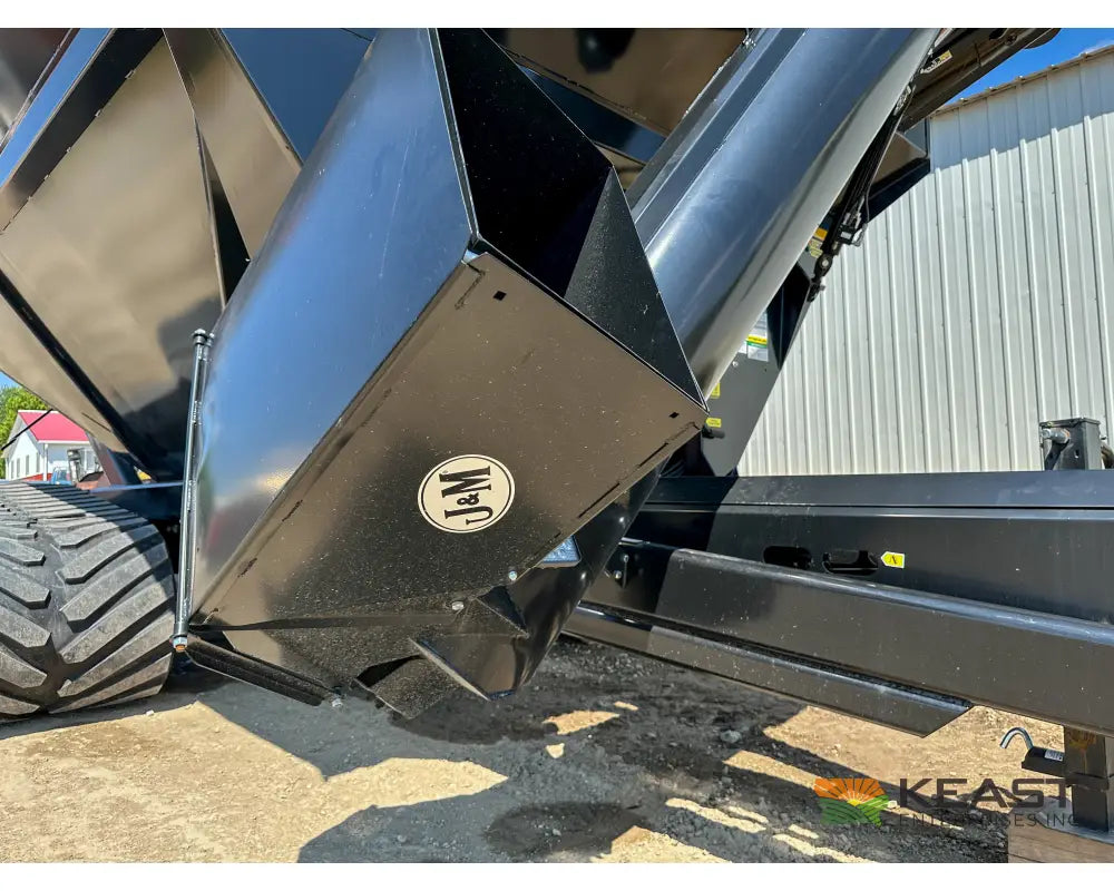 J&M 1312T Tracked Grain Cart 1,325 Bushel Capacity Roll Tarp 20’’ Discharge Scales Grain Carts